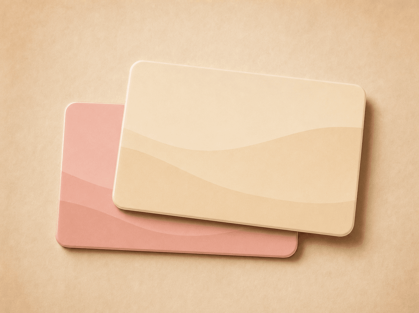 Editorial illustration of two plain insurance ID cards lying overlapped on a desk, the upper card sitting slightly forward of the one behind it (primary and secondary dental coverage, coordinated in order), warm muted tones
